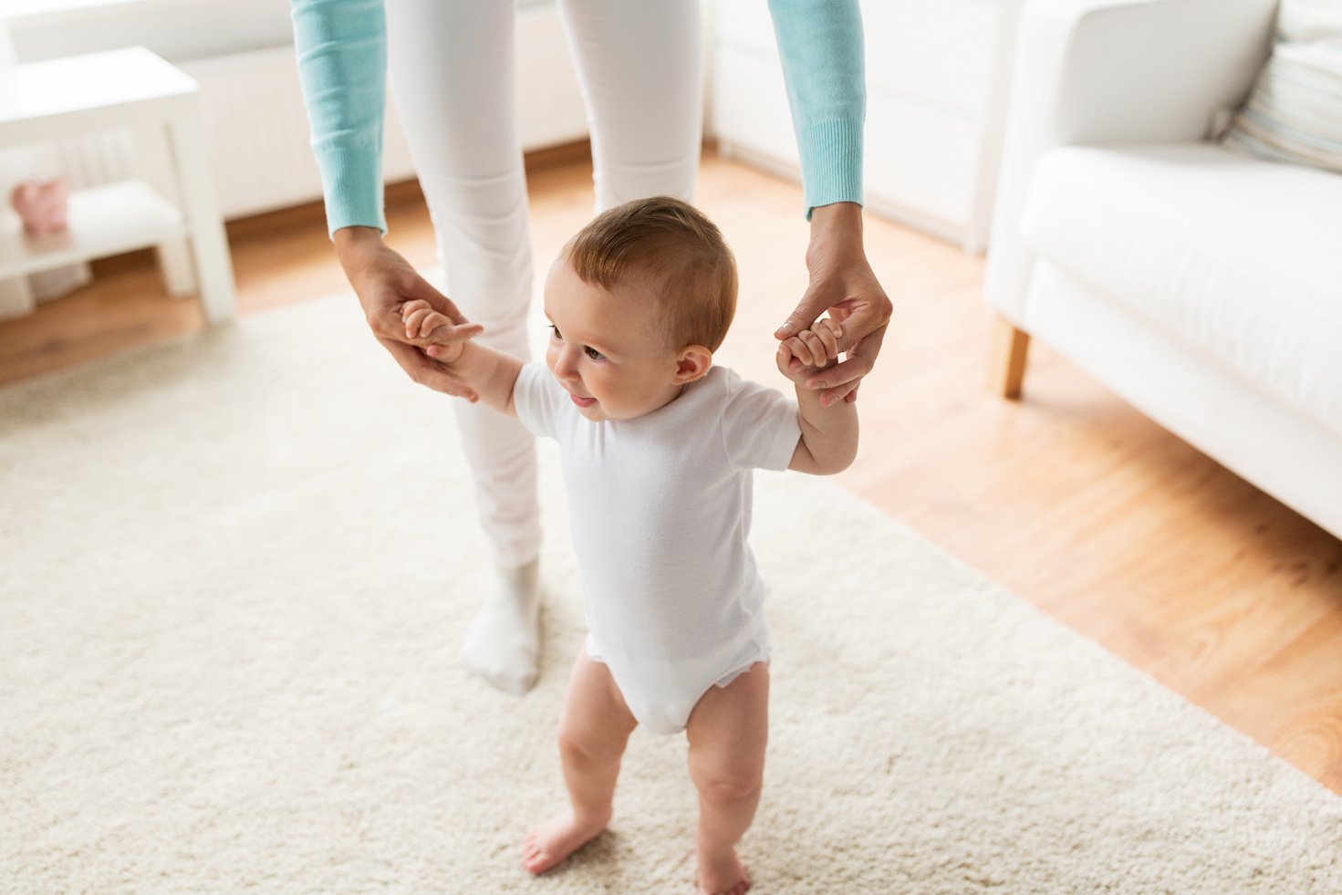 Happy Baby Learning to Walk 